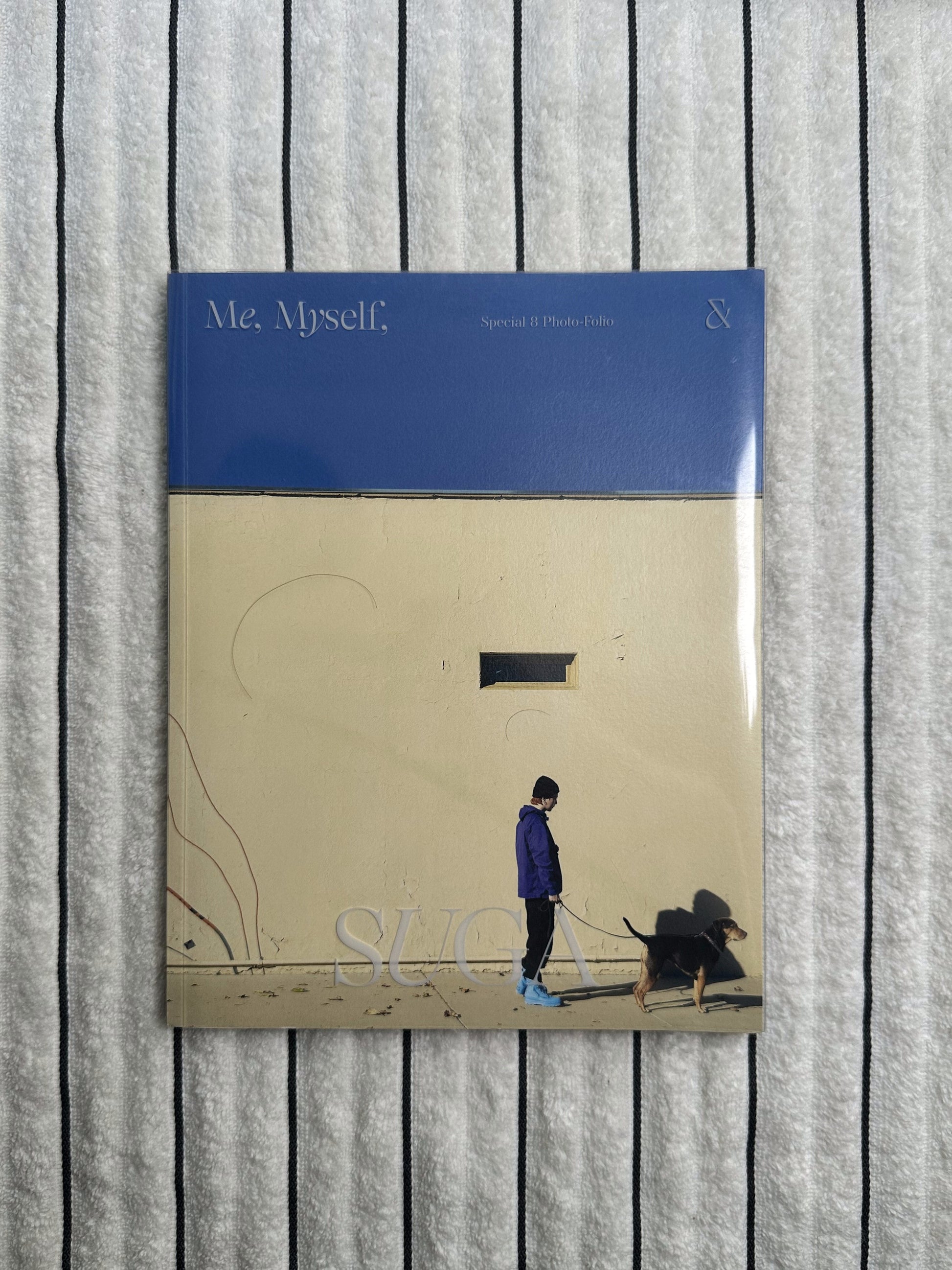 Book titled 'Me, Myself' on a striped surface