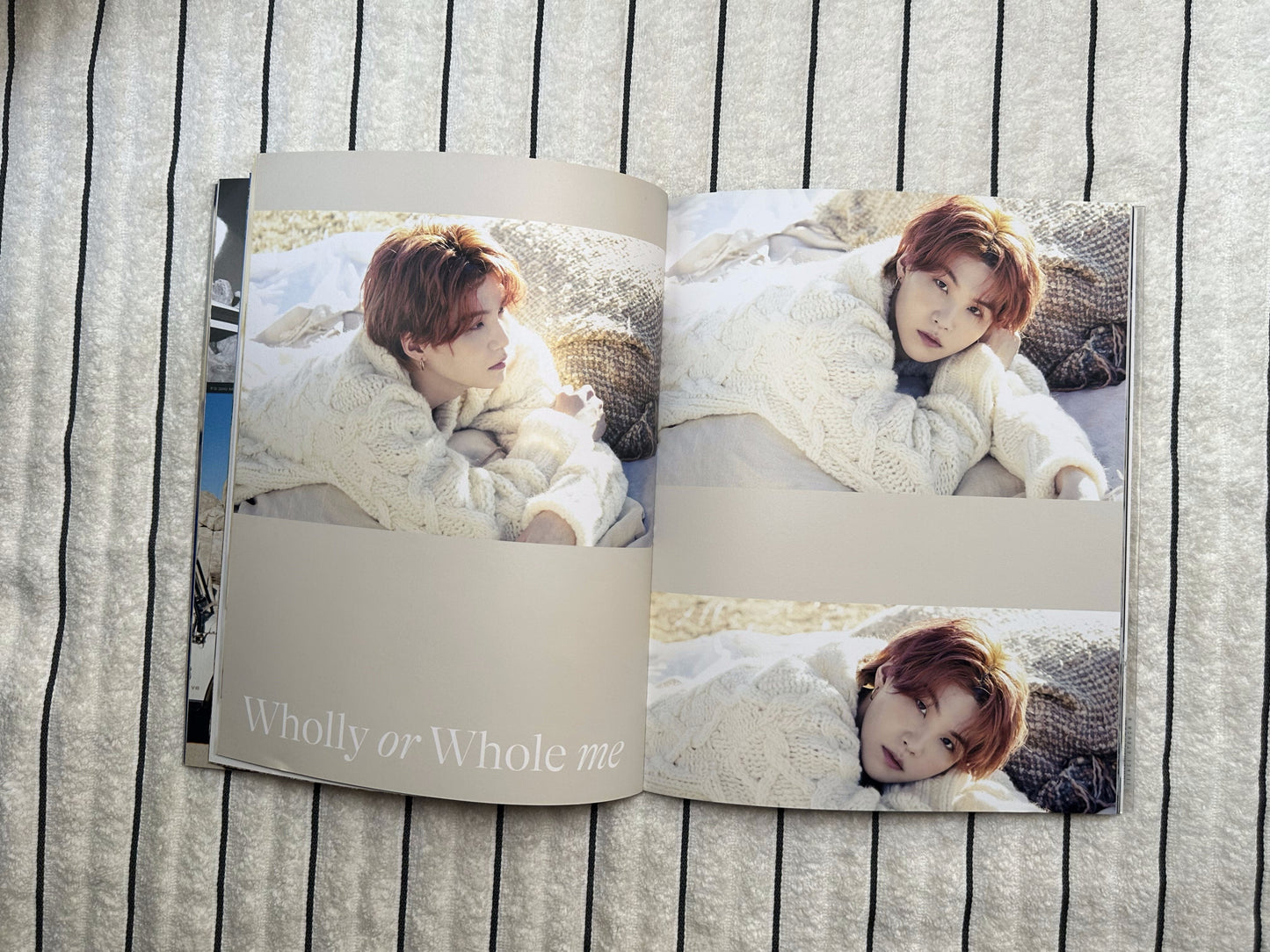Open book showing a person lying on a bed with a blanket, titled 'Wholly or Whole me'.